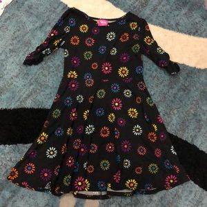 DreamWorks TROLL Black dress with floral/daisy design Sz M